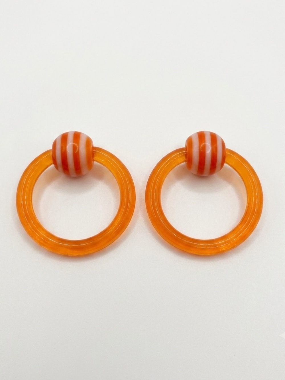 12g 7/16 Captive Bead Ring Pr Orange w/ Orange & White Striped Beads